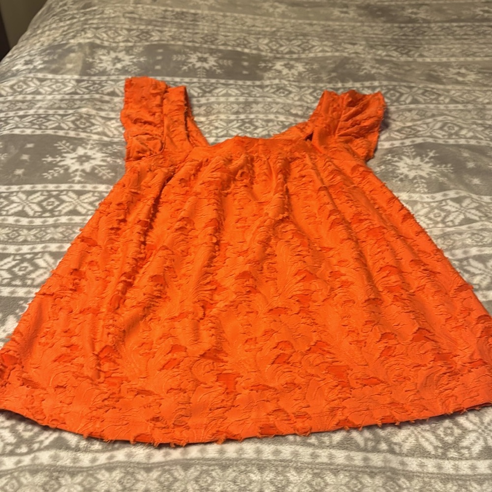 Brand New Lauren Conrad Ruffle Sleeve Tank Top
Orange color